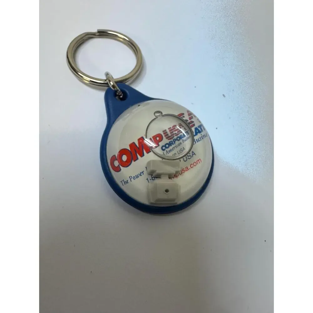 Vintage CompUSA computer keychain
